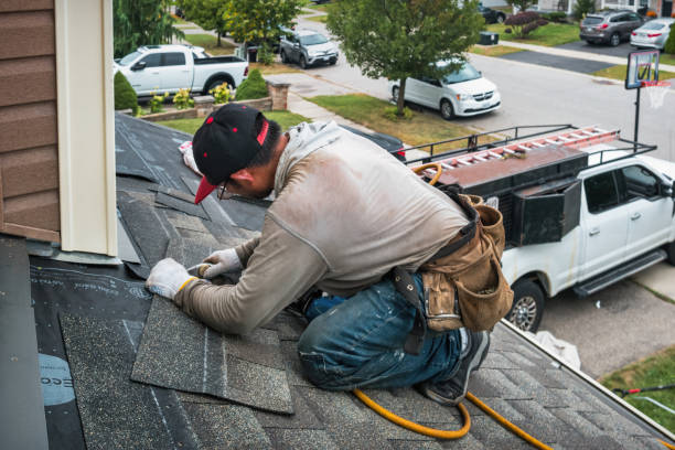 Professional Roofing technician working in Rochester, WA